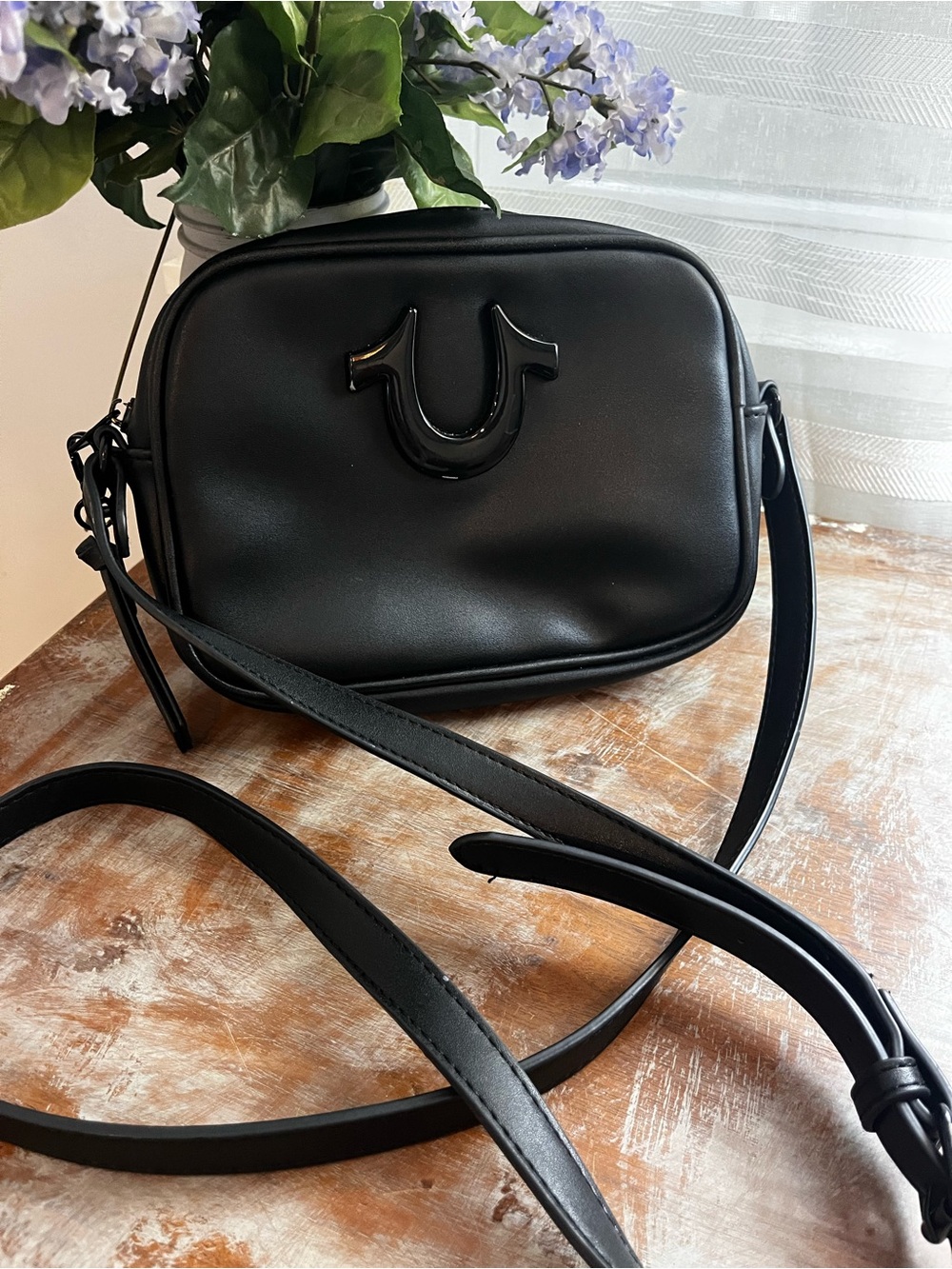 Black Leather Crossbody Bag with Signature Accent